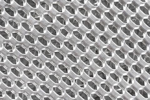 Texture or background of metal mesh with holes. Metal 스톡 사진