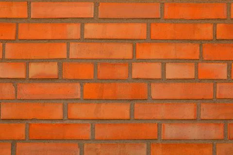 Texture of orange brick wall as background Stock Photos