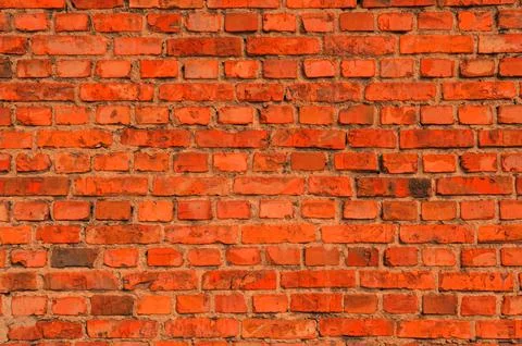 Texture of orange brick wall as background Stock Photos