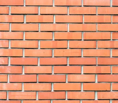 Texture orange brick wall Stock Photos