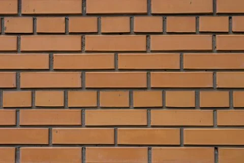 Texture of an orange brick wall Foto stock
