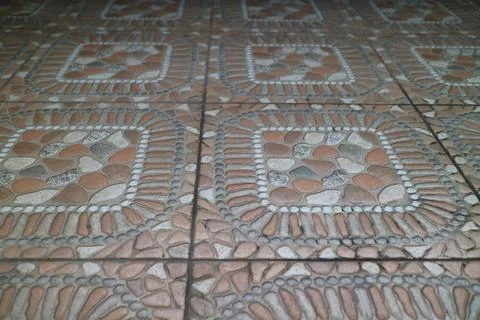 The texture of the orange embossed floor in front of the house Stock Photos