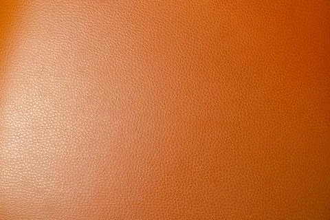Texture of a orange leather background. Stock Photos