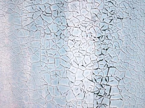 The texture of a painted blue wall that has cracked. Concept background, text Stock Photos