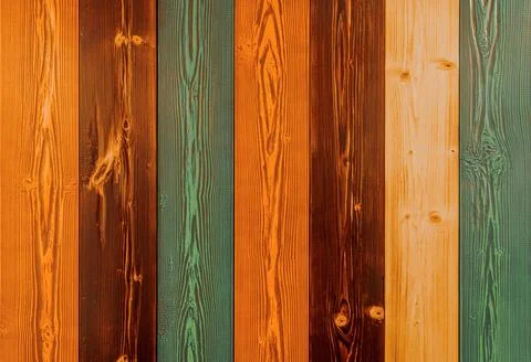 Texture from painted boards. Closeup vertical multicolored stripes. Stock Photos