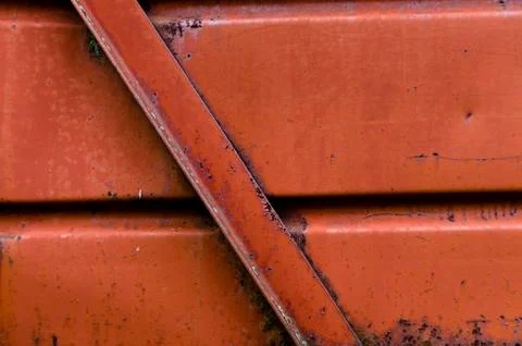 The texture of the painted brown metal surface. Stock Photos