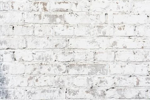 Texture painted old brick wall, damaged uneven brickwork, abstract background Stock Photos