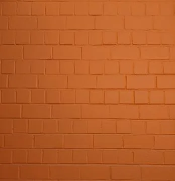 Texture of painted orange smooth brick wall, for background or backdrop Stock Photos