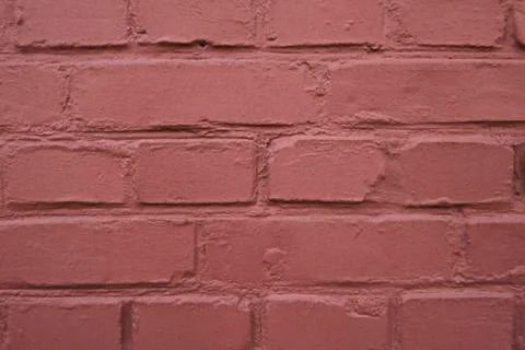 Texture of a painted red brick wall Stock Photos