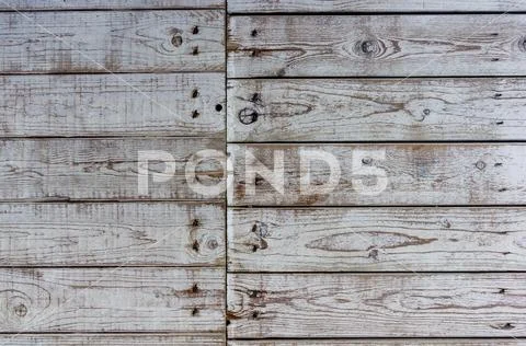 Texture of the painted shabby wooden flooring made of boards, grunge backgrou Stock Photos