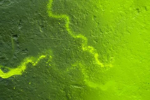 Texture of a painted wall. cement plate green color background Foto stock