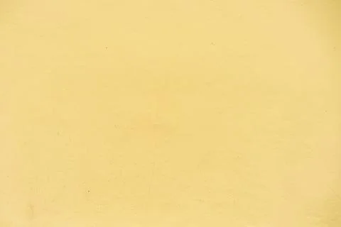 Texture of painted yellow wall as background Foto stock