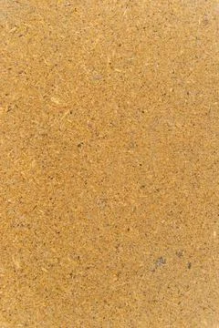 The texture of the panel made of pressed chips. Wooden background. Stock Photos