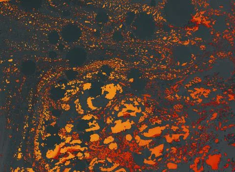 Texture of paper marbling design pattern in dark gray and orange colors Stock Photos