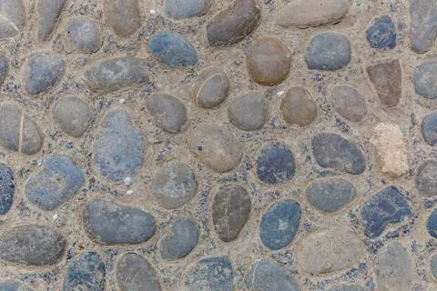 Texture of a path from river stones Stock Photos