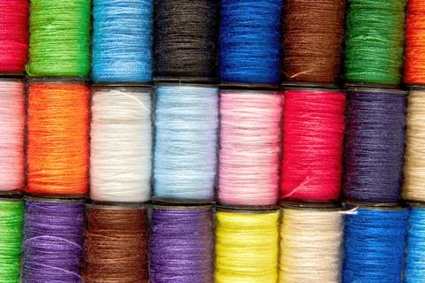 Texture pattern of the colorful thread spools Stock Photos