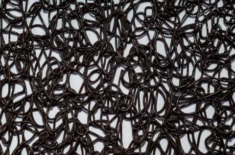 Texture pattern of dark brown rubber on a white background Foto stock