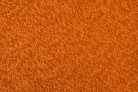 Texture with a pattern of a plurality of lines. Colored orange background. Stock Photos