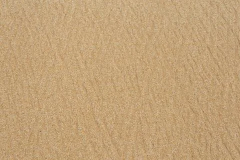 Texture, pattern of sand on the beach Stock Photos