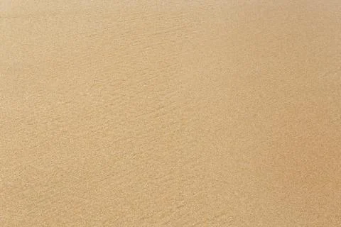 Texture, pattern of sand on the beach Stock Photos