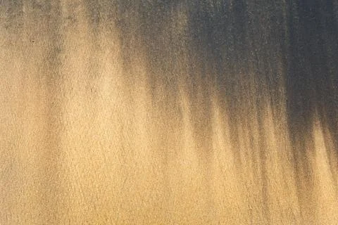 Texture, pattern of sand on the beach Stock Photos
