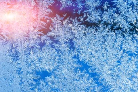 Texture of patterns on frozen window Stock Photos