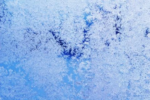 Texture of patterns on frozen window Stock Photos