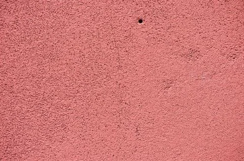 The texture of the peach wall. Macro, close. Rough Stock Photos