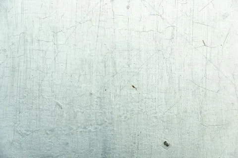 Texture of peeling and cracking white paint on concrete wall Stock Photos