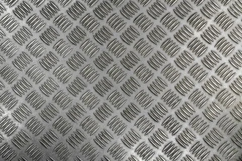 The texture of a perforated metal sheet Stock-Fotos