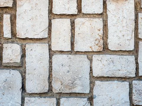 Texture photo of a random sized bricks rough masonry Stock Photos
