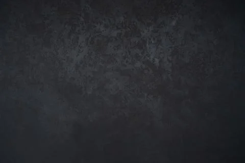 The texture of the plaster. Black and gray colors. Background, texture Stock Photos