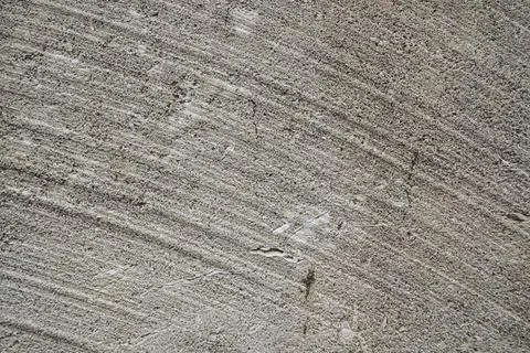 The texture of the plaster of the shell rock of light tones. Stock Photos
