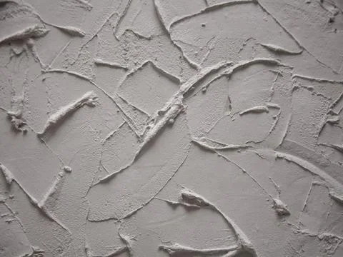 Texture of plaster smeared with a spatula Stock Photos