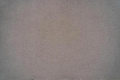 Texture of plaster on the wall. Gray background putty wall. Stock Photos
