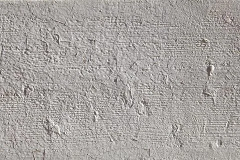 Texture of a plastered wall painted in gray. Stock Photos