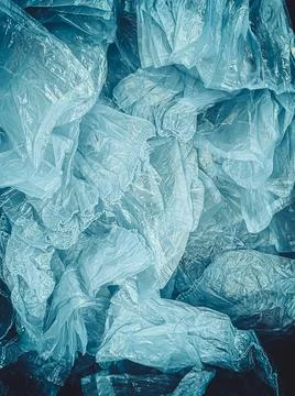 Texture of polyethylene, gray-blue background. Vertical image, artistic proce Stock Photos