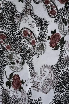 Texture of print fabric stripes leopard, paisley and flower for background Stock Photos