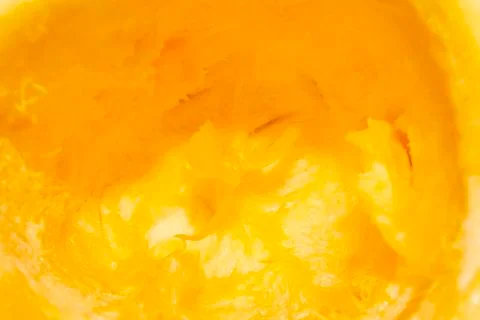 The texture of the pulp of a ripe pumpkin.Pumpkin background. Stock Photos