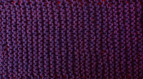 Texture of purple woolen threads for knitting. Stock Photos