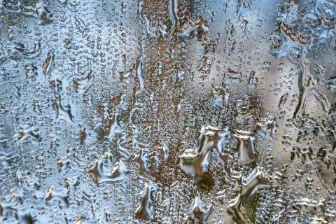 The texture of the raindrop is reflected on the mirror surface 6 Fotos Stock