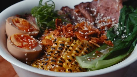 Texture of Ramen Ingredients with Grilled Corn, Eggs and Sliced Beef 库存影片 340457713