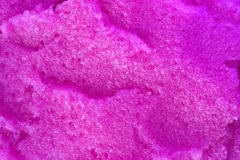 Texture of raspberry salt scrub, closeup. Smudges of skincare product for Foto stock