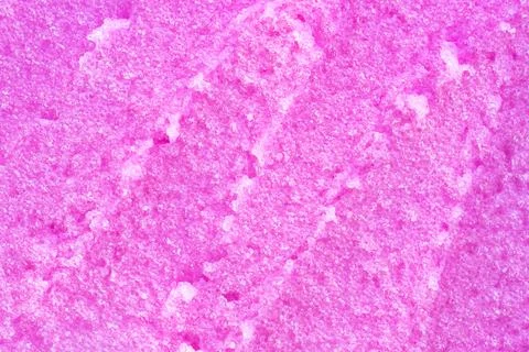 Texture of raspberry salt scrub, closeup. Texture of body scrub strokes with Stock Photos