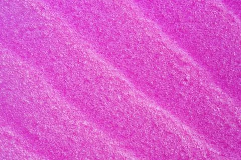 Texture of raspberry salt scrub, closeup. Smudges and strokes with salt Stock Photos