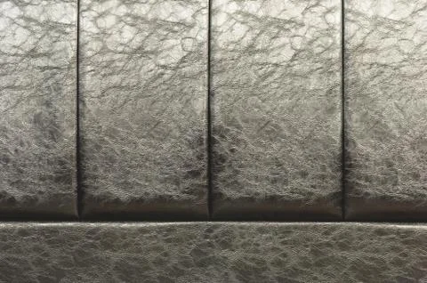 The texture of the real leather on the back of the bed. Vertical stripes of bulk Stock Photos
