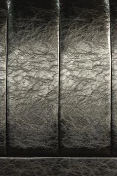 The texture of the real leather on the back of the bed. Vertical stripes of bulk Stock Photos