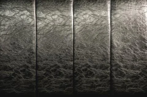 The texture of the real leather on the back of the bed. Vertical stripes of bulk Stock Photos
