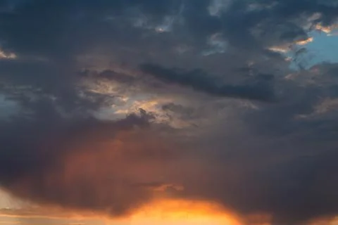 Texture of a red blue sky at sunset after rain Stock Photos