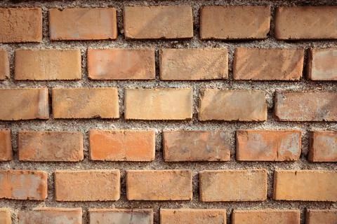 Texture of red brick wall as background, closeup view Stockfoto's